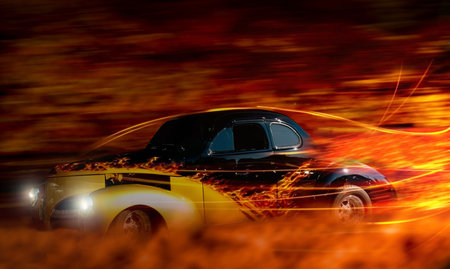 classic hot rod speeding through the night depictionの写真素材
