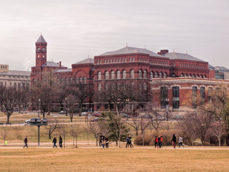 view of  The Smithsonian Institute from the grounds of The National Monument, Washington, DC, in late winter 2015のeditorial素材