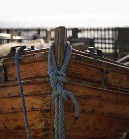 A close up shot of a moored rowing boatの写真素材
