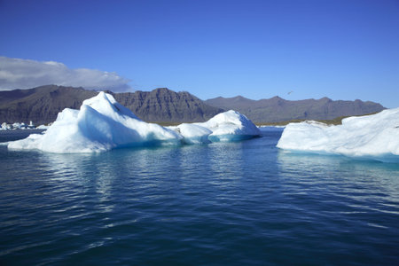 Two icebergs on Jokulsarlon lagoon Iceland