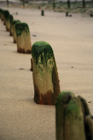 well worn breakwaters on Sandsend beach near Scarboroughの写真素材