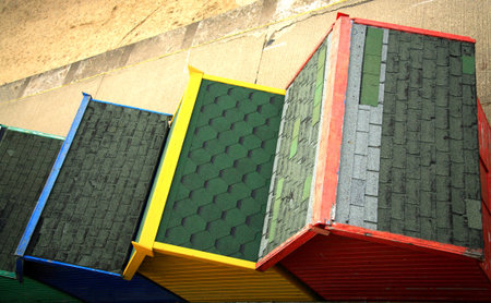 Row of colourful beach huts from aboveの写真素材