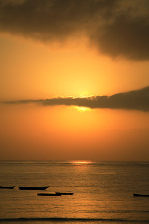 Early morning sunrise Mombassa beach Africaの写真素材