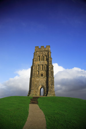 Glastonbury Tor against a vivid blue sky Somerset Englandの写真素材