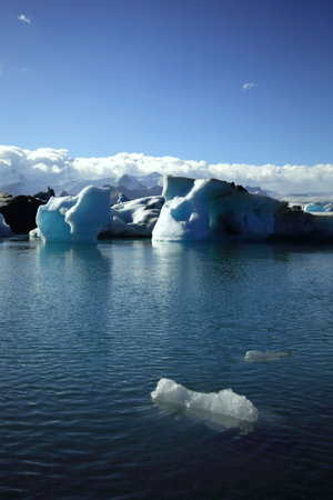 A small iceberg in the foreground Jokulsarlon lagoon Icelandの写真素材
