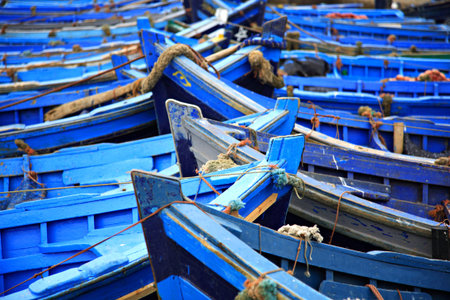 Blue fishing boats Essaouira harbour Moroccoの写真素材