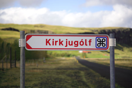 Signpost for Kirkjugolf the floor level basalt columns Icelandの写真素材