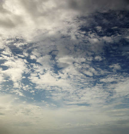 Fluffy clouds and blue skyの写真素材