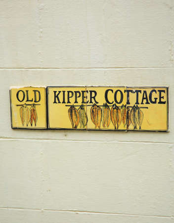 Old Kipper Cottage sign in Whitby North Yorkshireの写真素材