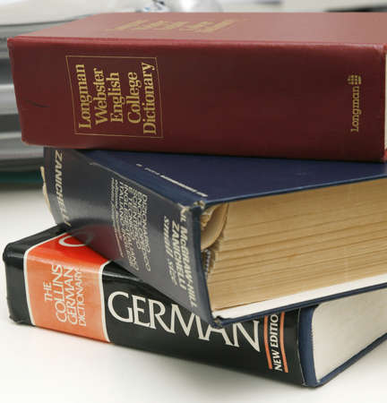 A pile of dictionaries on a desk 15 July 2008のeditorial素材