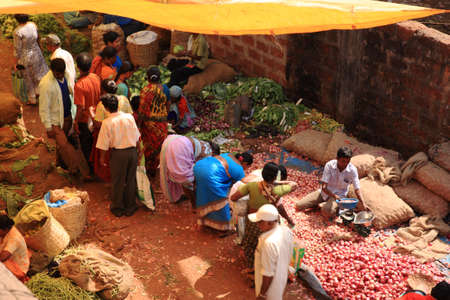 People at an Indian Food Market in the street Goa India 25 January 2008のeditorial素材