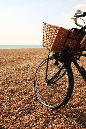 Bike on the pebble beach at Brighton Englandの写真素材