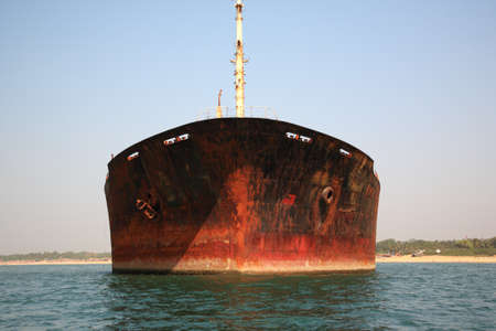In front of the stranded River Princess Goa Indiaの写真素材