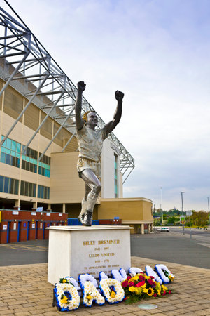 LEEDS, UK - MAY 4, 2014: A statue of former Leeds\' captain Billy Bremner at Elland Road stadium, home of Leeds United Football Club since 1919 following the disbanding of Leeds City F.C.のeditorial素材