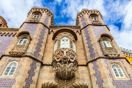 Stone carving under a window at historic Pena Palace, Sintra, Portugal.のeditorial素材