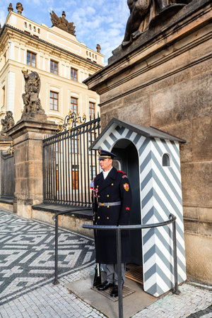 PRAGUE, CZECH REPUBLIC - NOVEMBER 14, 2015 : The Castle Guard at the entrance to the Castle area in Prague. Unidentified man.のeditorial素材