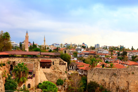 ANTALYA, TURKEY - NOVEMBER 8, 2016: Roof tops, Roman walls and minarets in the historic Old Town of Antalya, known as Kaleici.のeditorial素材