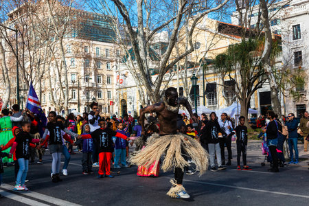 LISBON , PORTUGAL - FEBRUARY 10, 2018: African dancer in costume at a procession on the Av. da...
