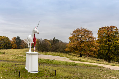 WAKEFIELD, YORKSHIRE, UK - November 6, 2019: Damien Hirst sculpture Myth is of white unicorn with half of its skin flayed  revealing vibrant red, pink and yellow musculature and tissues.のeditorial素材
