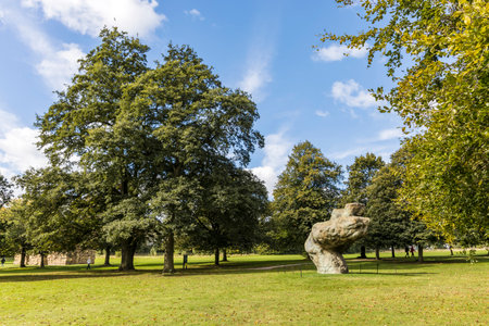 WAKEFIELD, YORKSHIRE, UK - September 25, 2020: Scenic view at the Yorkshire Sculpture Park with modern art pieces displayed in rural setting.のeditorial素材