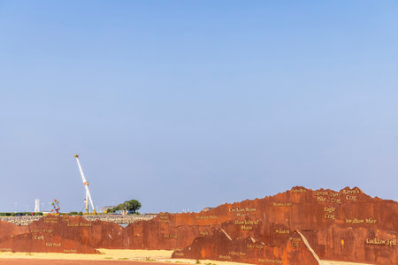 Morecambe, UK - July 21, 2021: Panorama steal sculpture of Lake District mountains outline on seafront promenade at Morecambe Bay.のeditorial素材