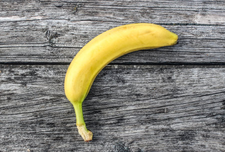 Banana on wooden banner illustrationの写真素材