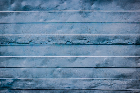 blue grooved metal texture background.の写真素材