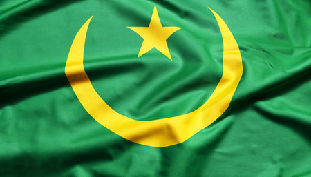 Mauritania flag is depicted on a sports cloth fabric with many folds. sport team bannerの写真素材
