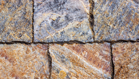 Brown stone with cracks on the surface