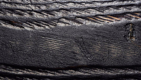 Dark wood texture background. Vintage old black boards hardwood. Charcoal timber quality high. Pattern wood grain material polished. Wooden floor detailed photo.の写真素材