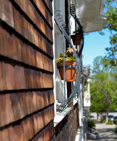 Architectural Details of beautiful curved steel with wooden shingles wall.の写真素材