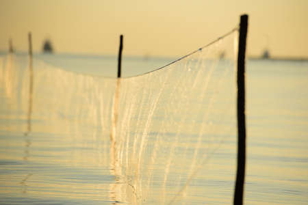 The fish trap in the seaの写真素材