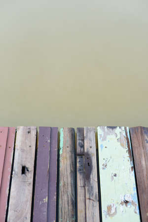 Blur background, Old wooden boards are placed together as a small bridge. Extends into the riverの写真素材