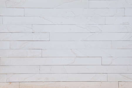 Tile wall with rough floor backgroundの写真素材