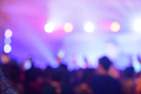 Blurred background , Bokeh lighting on stage in concert with audience, Celebration concept.の写真素材