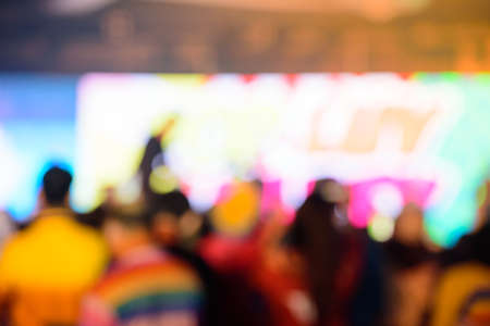 Blurred background , Bokeh lighting on stage in concert with audience, Celebration concept.の写真素材