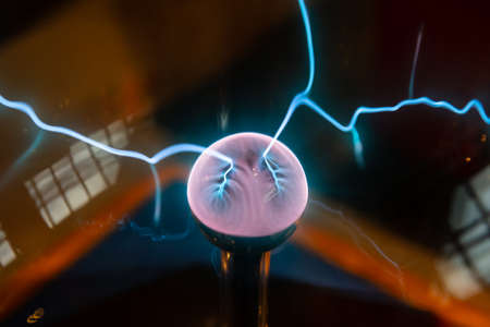 Blur background, Lighting from the energy of the plasma ball is displayed in the science museum. Waiting to educate children and interested peopleの写真素材
