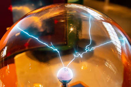 Blur background, Lighting from the energy of the plasma ball is displayed in the science museum....