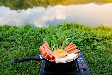 Extraordinary noodles, Korean  style, making forâ diner atâ camping.â It'sâ wonderful meal for winter camping.の写真素材