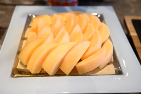 Fruits are placed in the buffet line.の写真素材