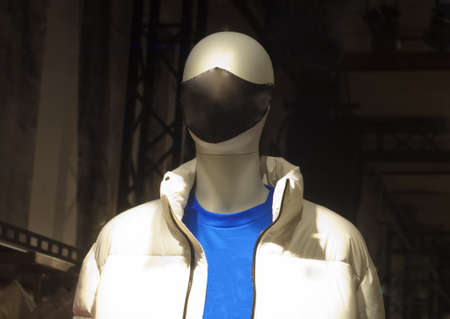 Reusable protective mask on the mannequins face.