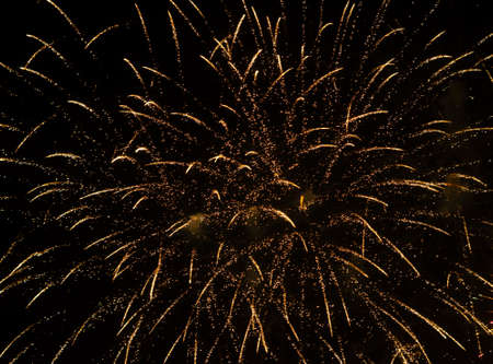 many sparks in time fireworks in night skyの写真素材