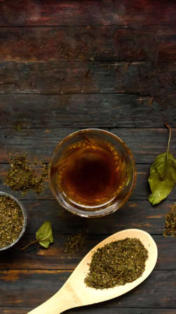 Green tea composition on wooden background.の写真素材