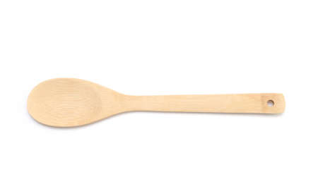 wooden spoon isolated on a white backgroundの写真素材
