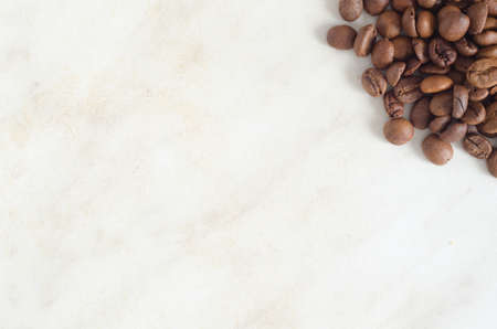Coffee beans background.Heap of coffee beans in the corner.の写真素材