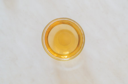 a glass of apple juice on white background,top viewの写真素材