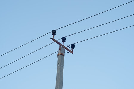 a electric pole with electricity power transmission,close upの写真素材