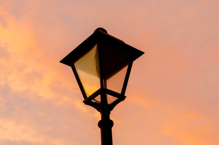 Close up, retro street lamp at sunset.の写真素材