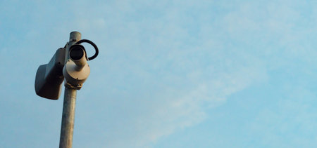 The security camera is on the mast,banner.の写真素材