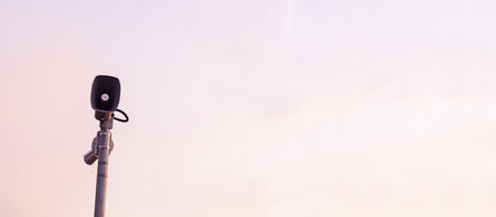 The security camera is on the mast,banner.の写真素材